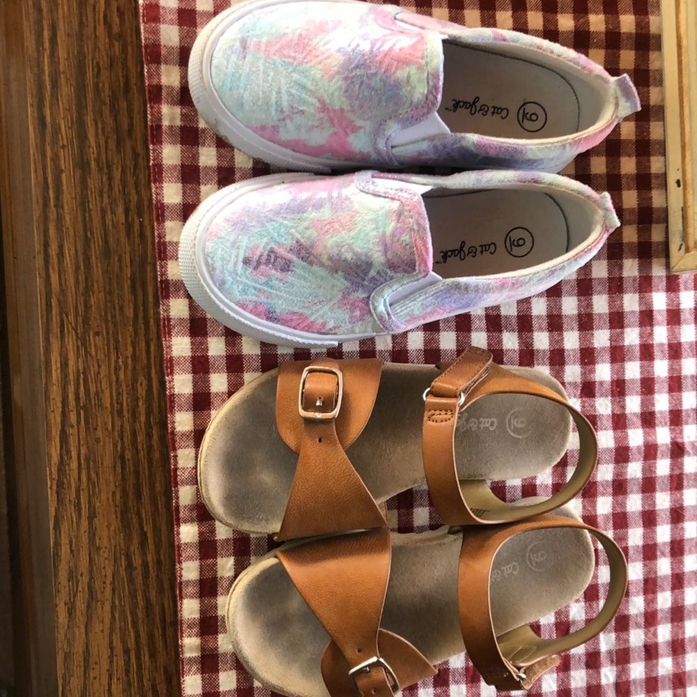 Toddler size 9 sandals/slip on shoes. Worn but in good shape.